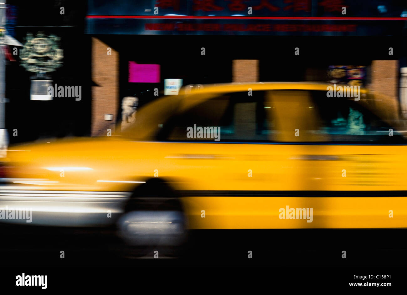 Blurred yellow taxi Stock Photo