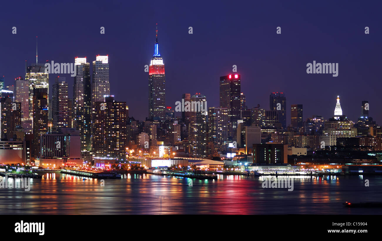New York City Manhattan skyline panorama at night over Hudson River ...