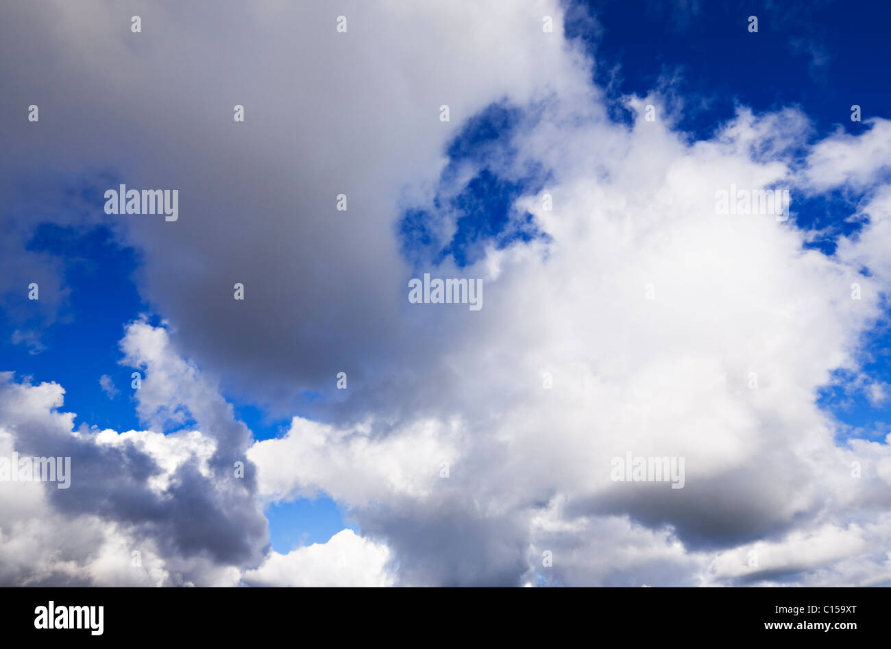 White clouds with vivid blue sky background Stock Photo - Alamy