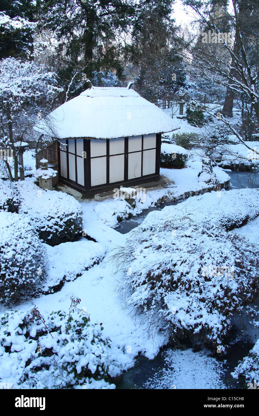 Estate of Tatton Park, England. Picturesque winter view of the thatched tea house at Tatton Park’s Japanese Garden. Stock Photo