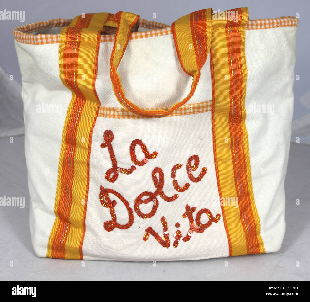 canvas shopping bag with La Dolce Vita on the front. Stock Photo