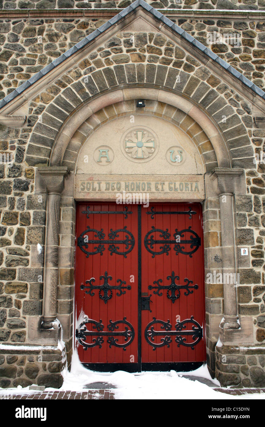 Church doors of St-Peters church in winter in Gulpen in the Neterlands Stock Photo