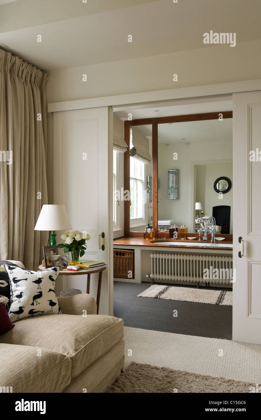 View through doorway to bedroom en suite Stock Photo