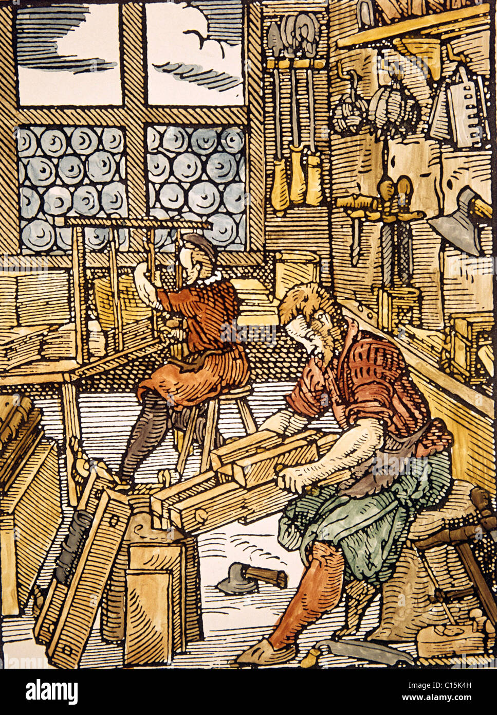 16C engraving. Bookbinder, craftsman and apprentice Stock Photo