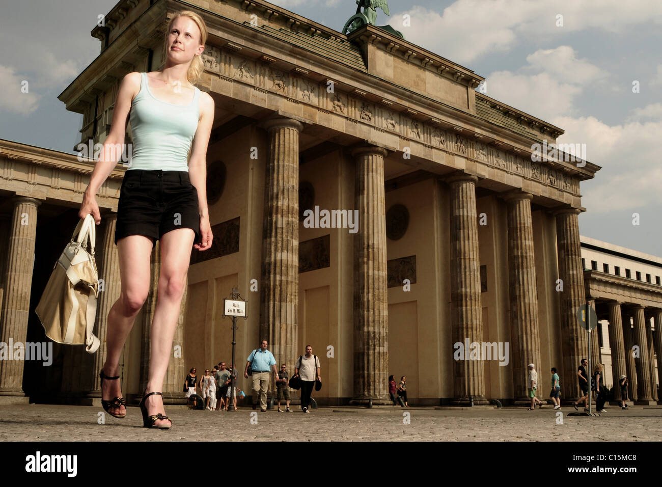 Young woman at Brandenburg Gate, Berlin, Germany, Europe Stock Photo ...