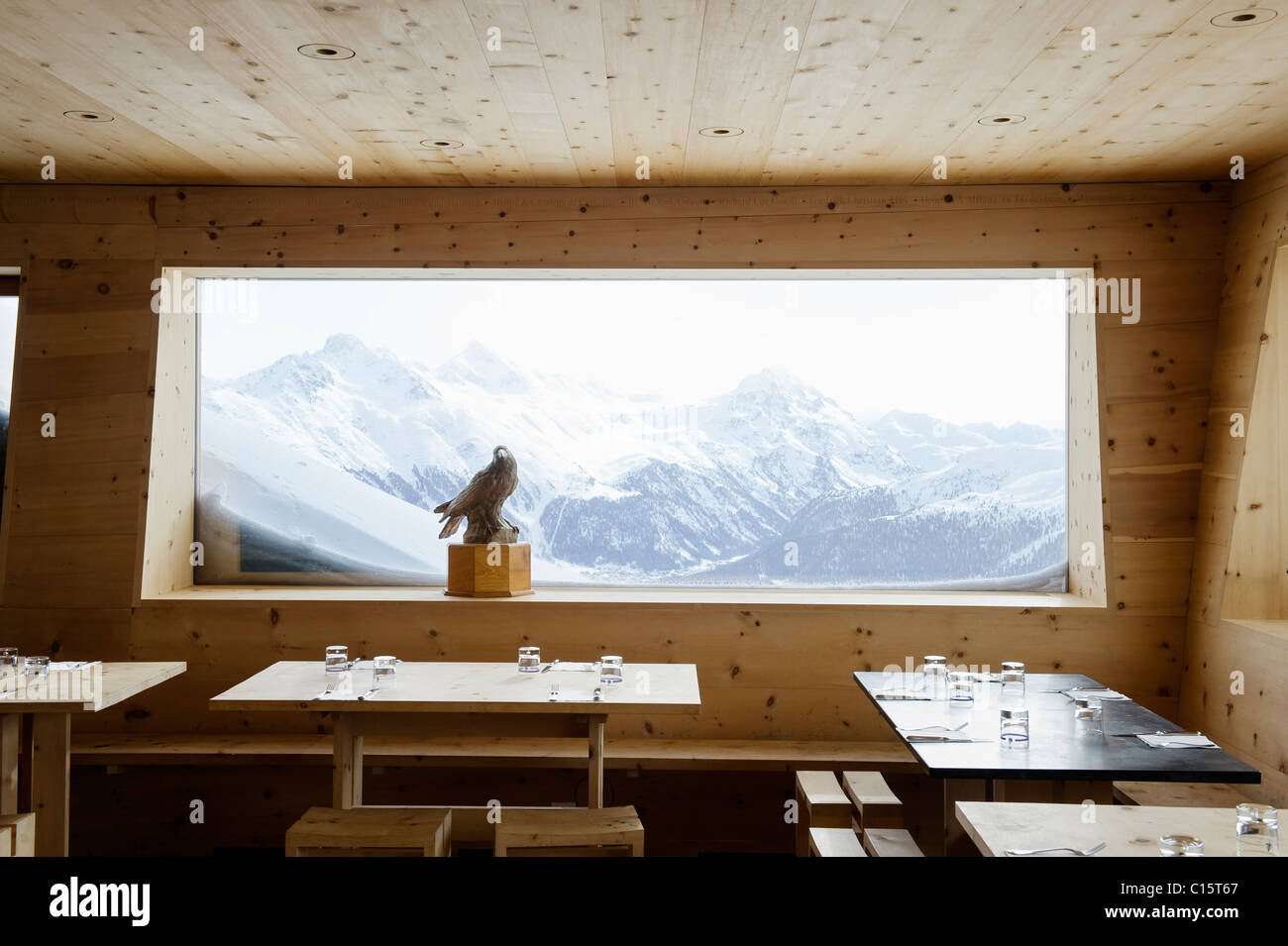 Panoramic window with mountain scenery at the Corviglia Club, St Moritz Stock Photo