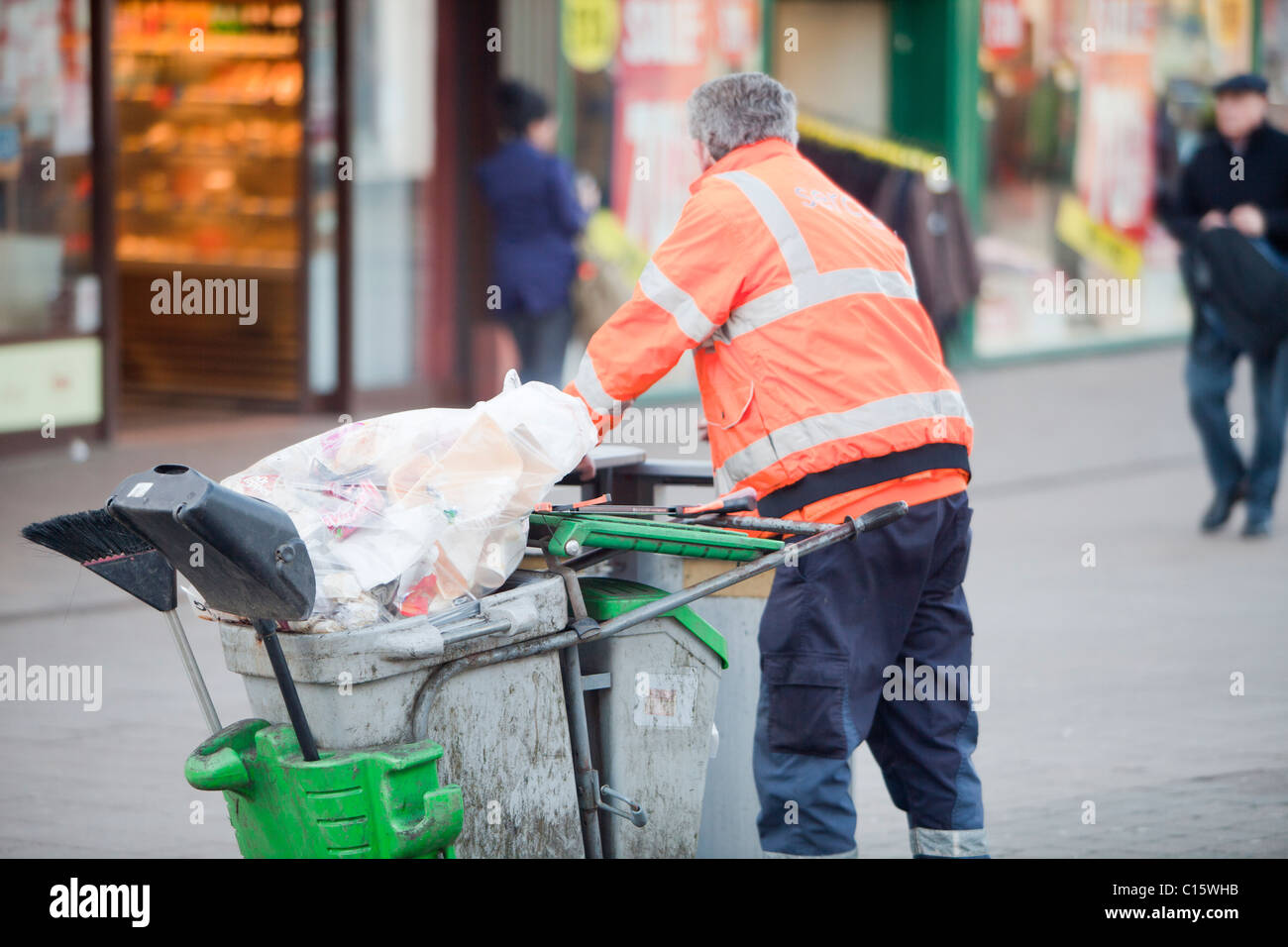 A street sweeper in Loughborough, Leicestershire, UK. Stock Photo