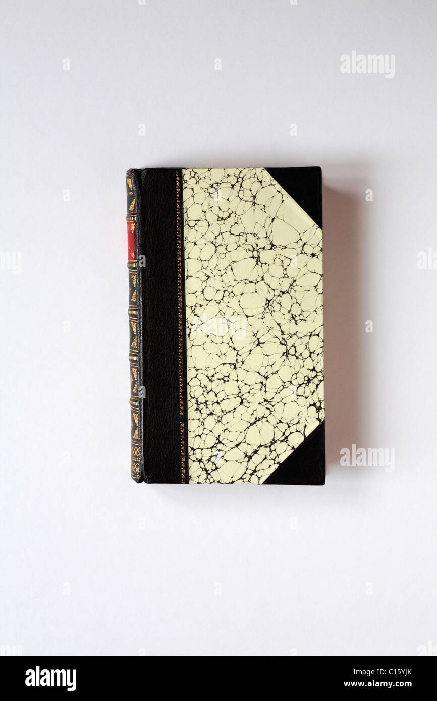 calf hide leather bound cover of Poems of Rural Life book showing gold leaf pattern isolated on white background Stock Photo