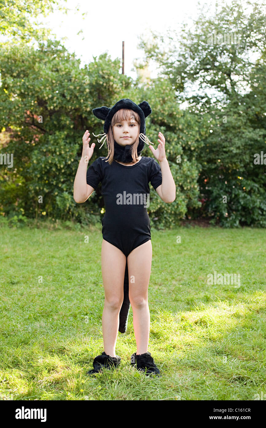 Girl dressed as cat Stock Photo