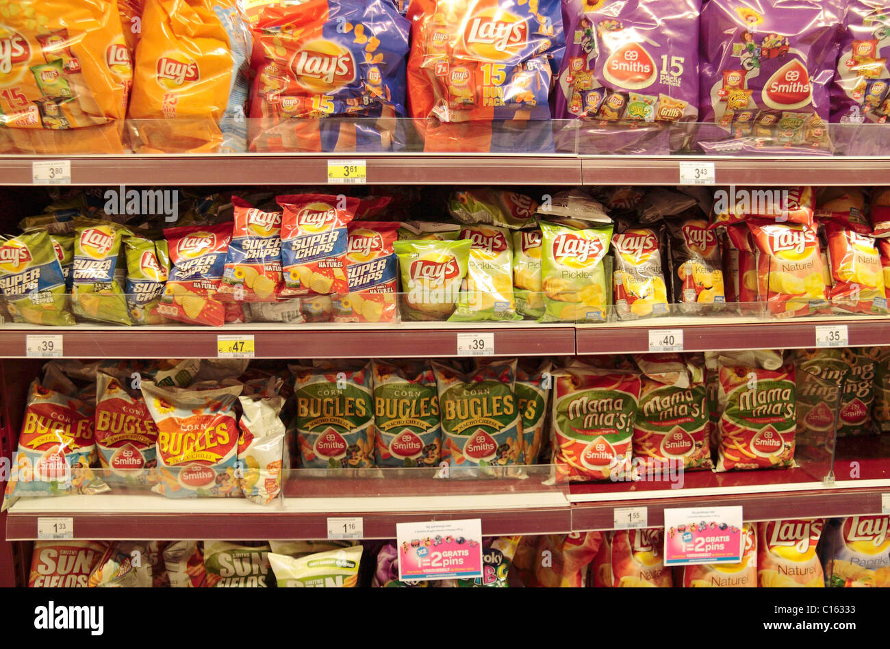 Rows Of Potato Crisps Chips On Supermarket Shelves In The Centre
