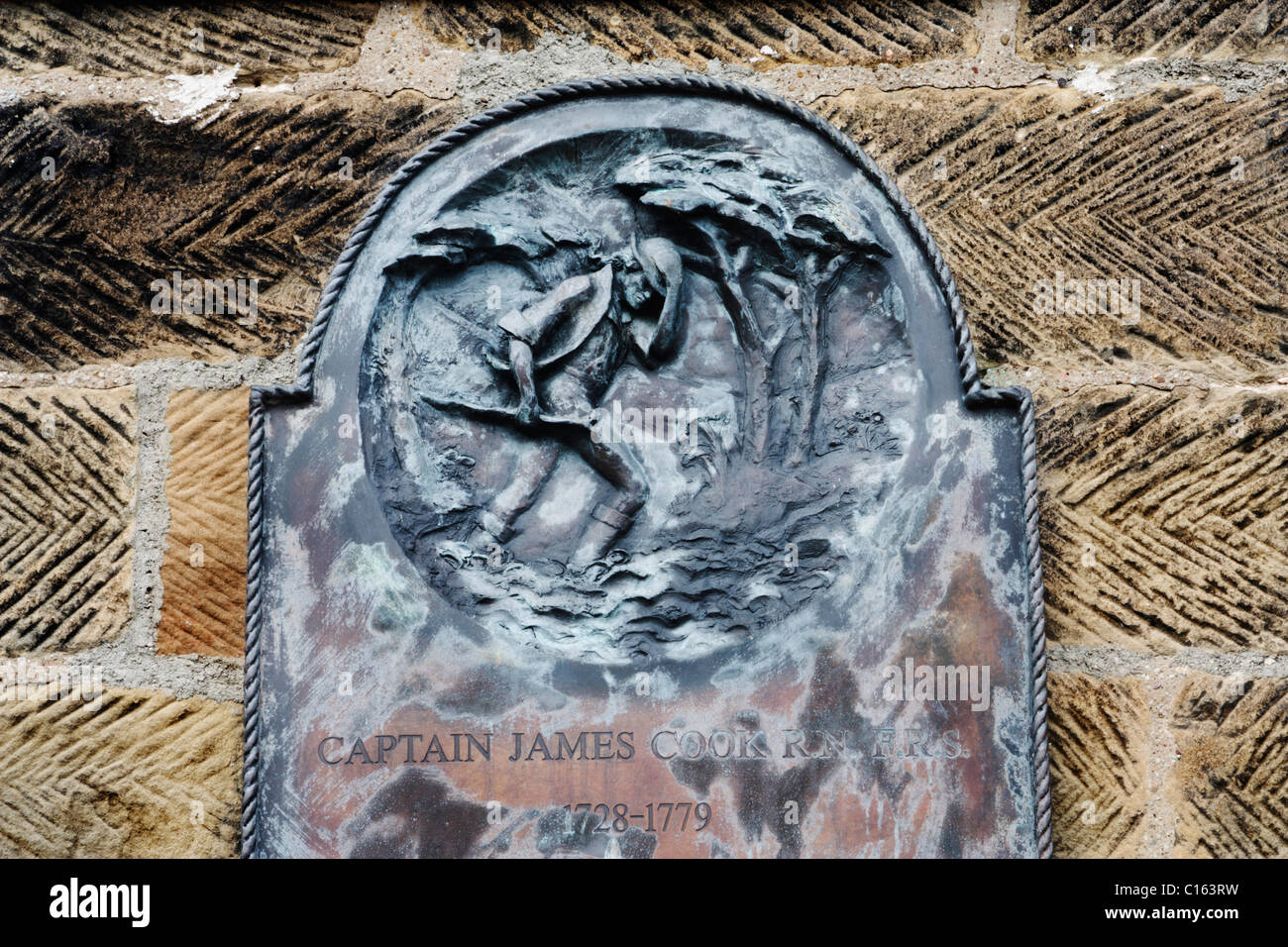 Plaque on wall of Captain Cook Schoolroom Museum, depicting young James Cook who studied at the school Stock Photo