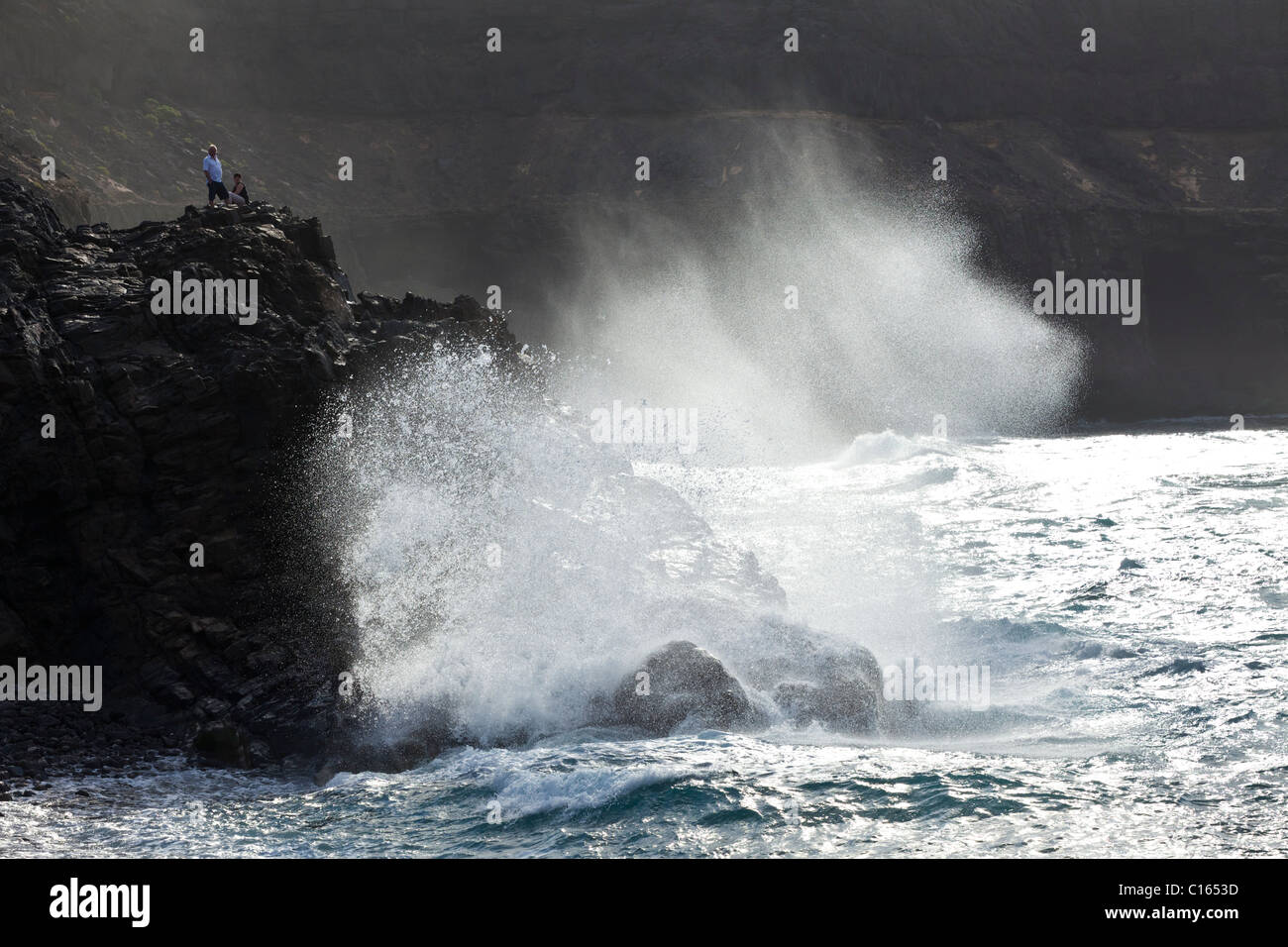Heavy Atlantic seas breaking against rocks at the seaside village of Los Molinos on the Canary Island of Fuerteventura Stock Photo