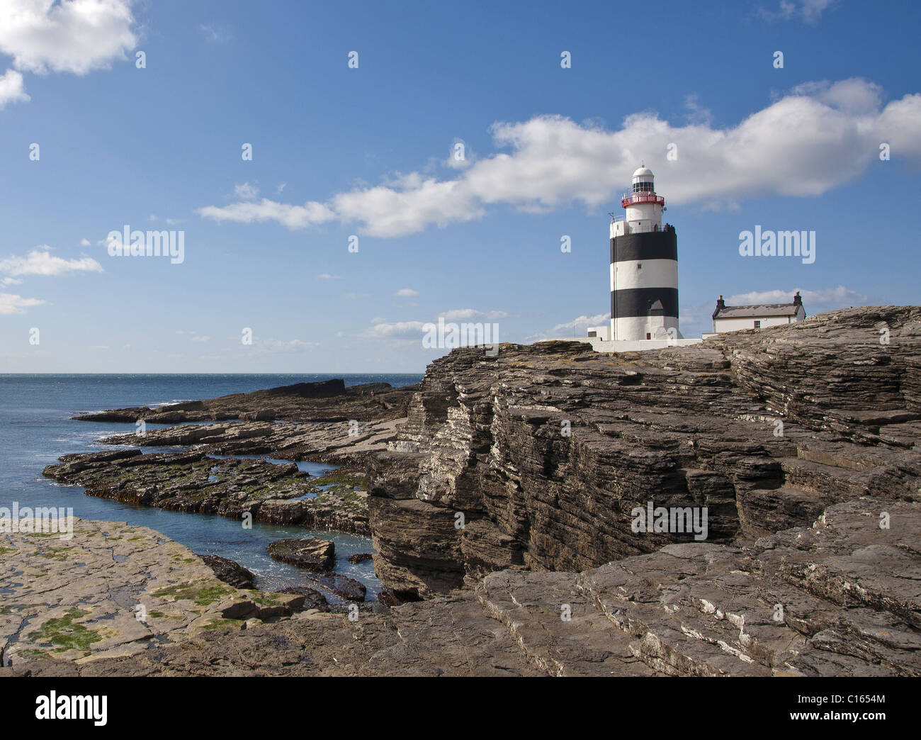 Hook Lighthouse  situated at the tip of the Hook Peninsula in County Wexford, in Ireland,is the oldest lighthouse in the world. Stock Photo