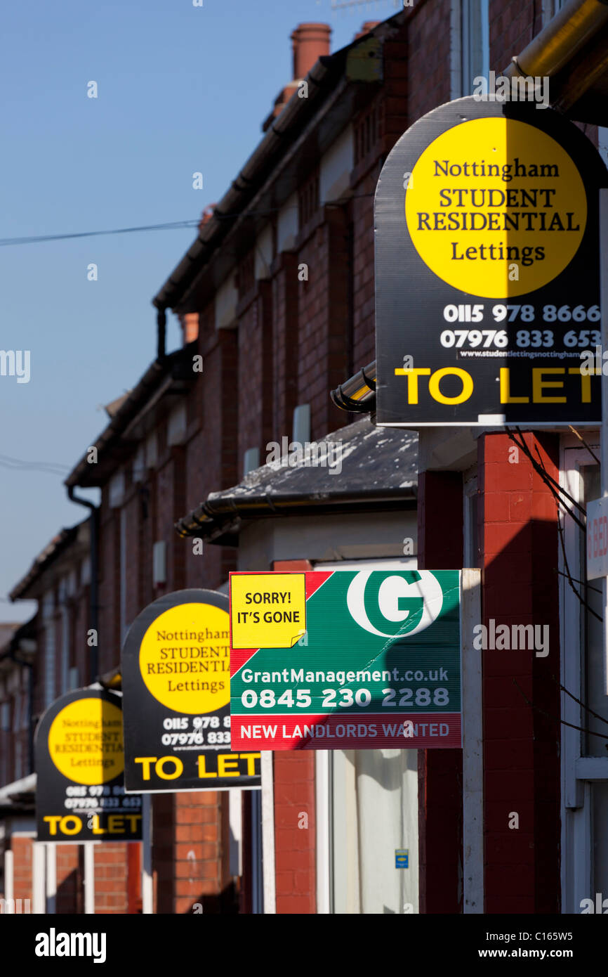 For sale and to let signs in a residential area Stock Photo