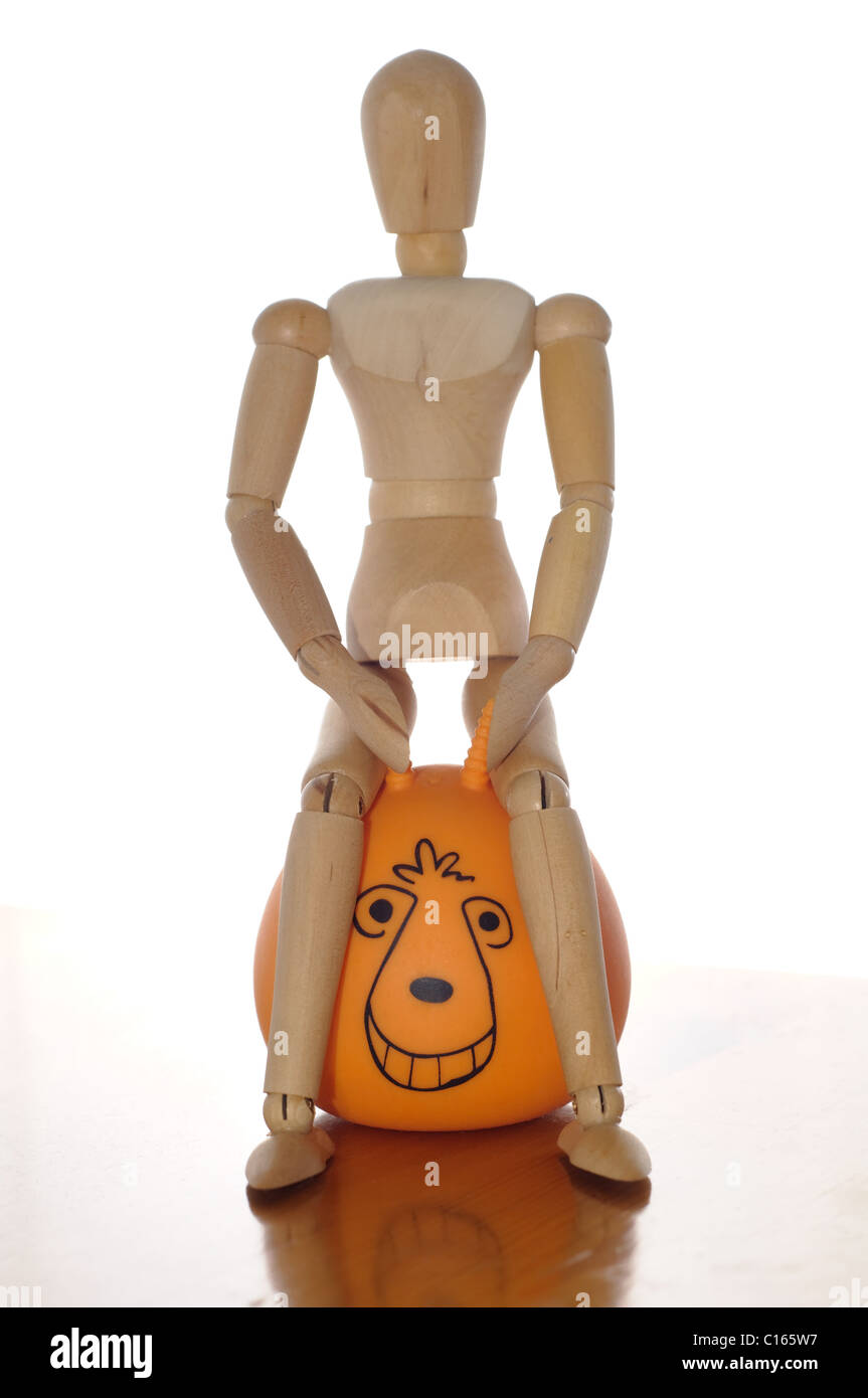 A mannequin on a space hopper Stock Photo