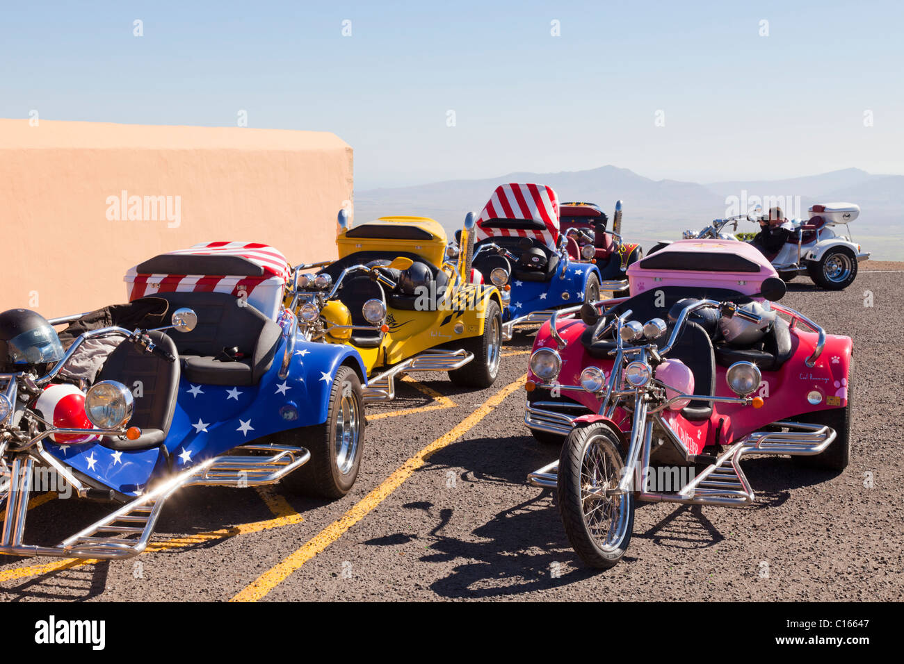 Motorcycle cruiser trikes for transporting tourists, parked at Mirador de Morro Velosa, on the Canary Island of Fuerteventura Stock Photo