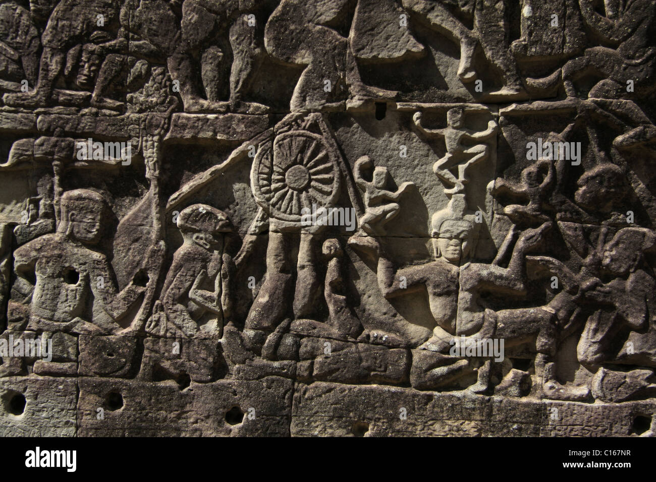 Bas-relief in the outer gallery of the Bayon, a temple located inside the royal city of Angkor Thom, Angkor Archaeological Park. Stock Photo