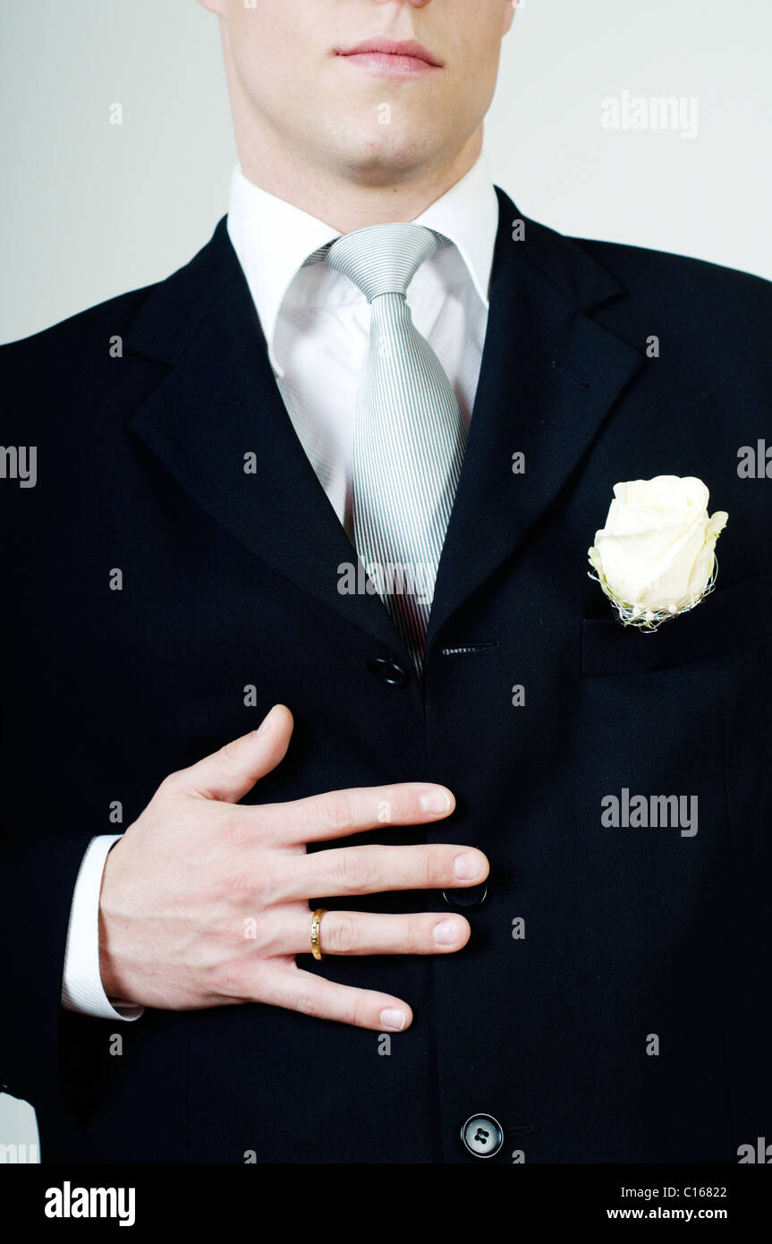 Groom showing his wedding ring Stock Photo