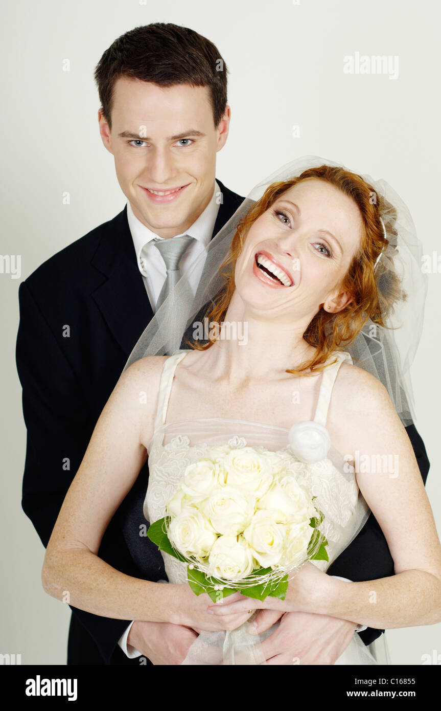 Bridal couple with bridal bouquet Stock Photo