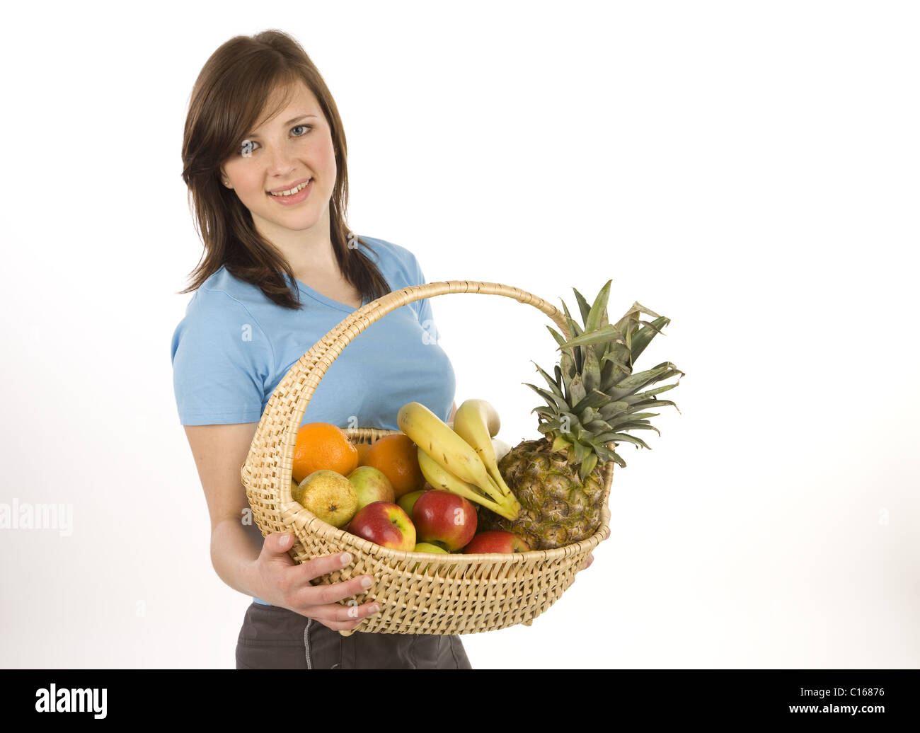 Woman with fruit basket Stock Photo - Alamy
