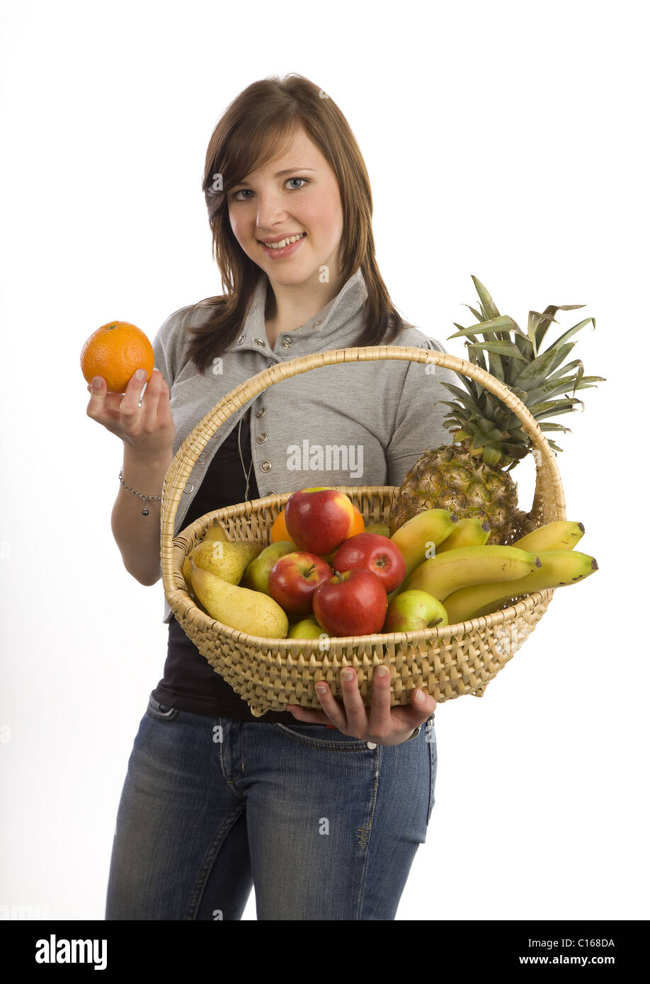 Woman with fruit basket Stock Photo - Alamy