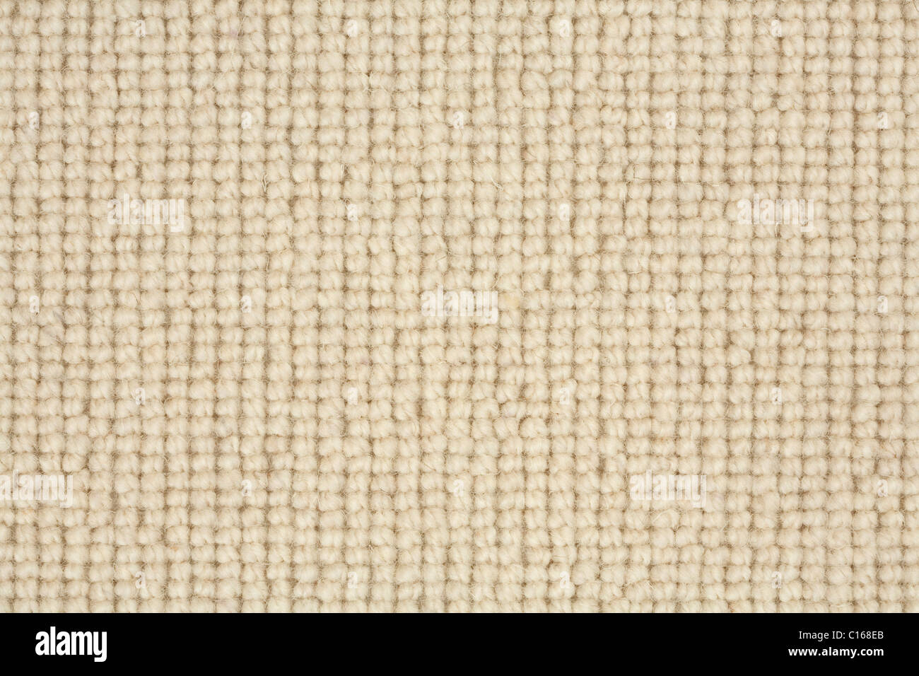 Detail of a loop pile berber carpet in natural colour Stock Photo