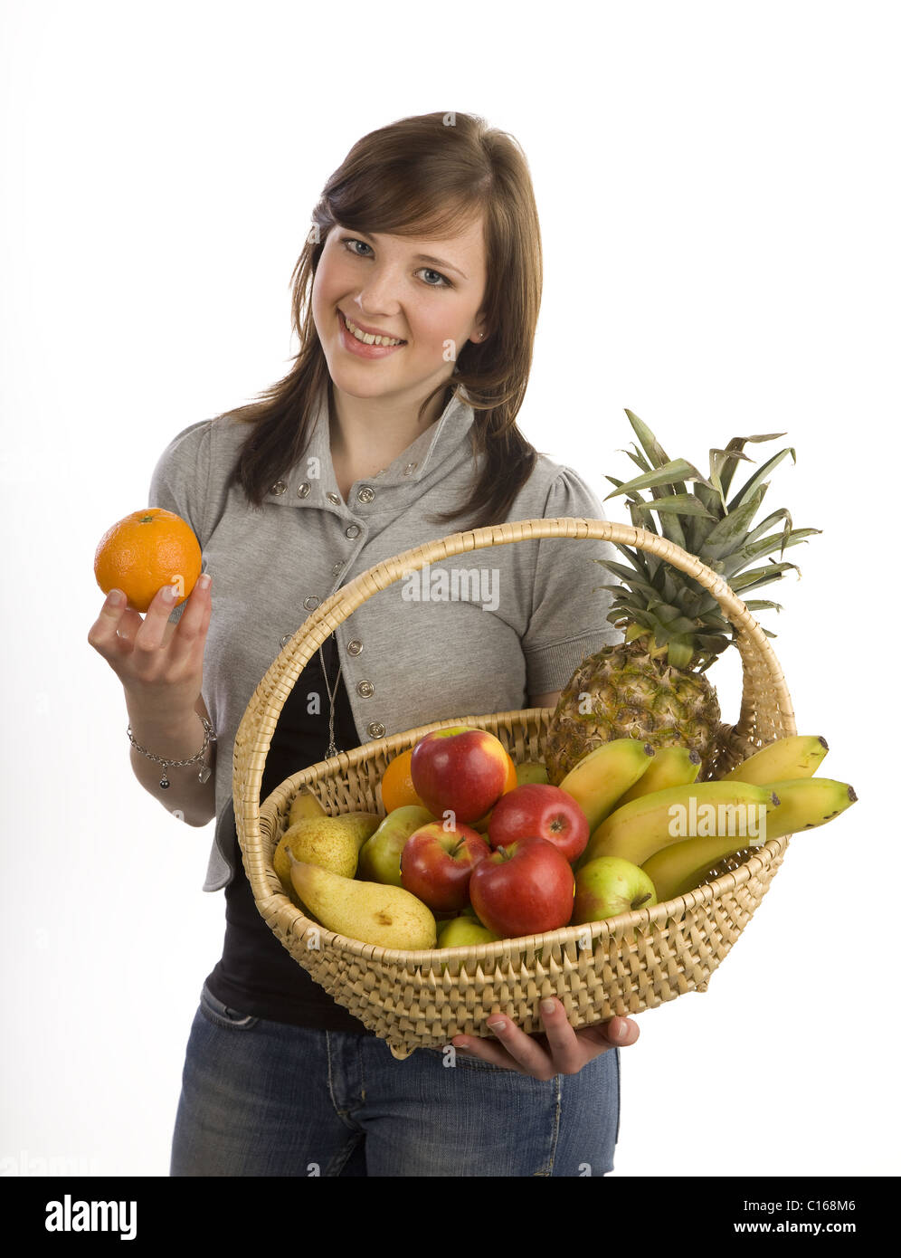 Woman with fruit basket Stock Photo - Alamy