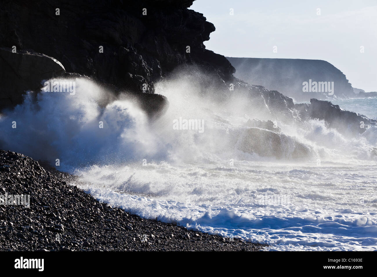 Heavy Atlantic seas with large waves crashing onto rocks at Ajuy on the Canary Island of Fuerteventura Stock Photo