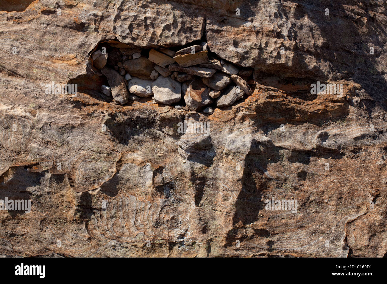 Canyon Burial Caves. Isalo National Park. Madagascar. Human bodies entombed with rocks by family members. Stock Photo