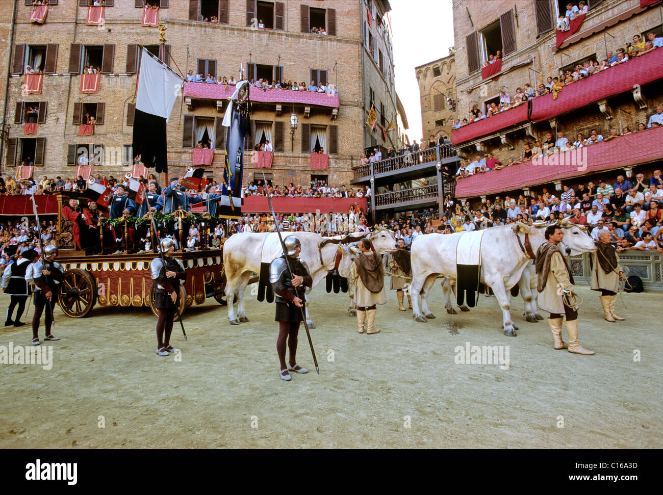 Historic Palio horse race, Carroccio, triumph wagon, with the trophy, the Palio, flag, Piazza Il Campo, Sienna, Tuscany, Italy Stock Photo