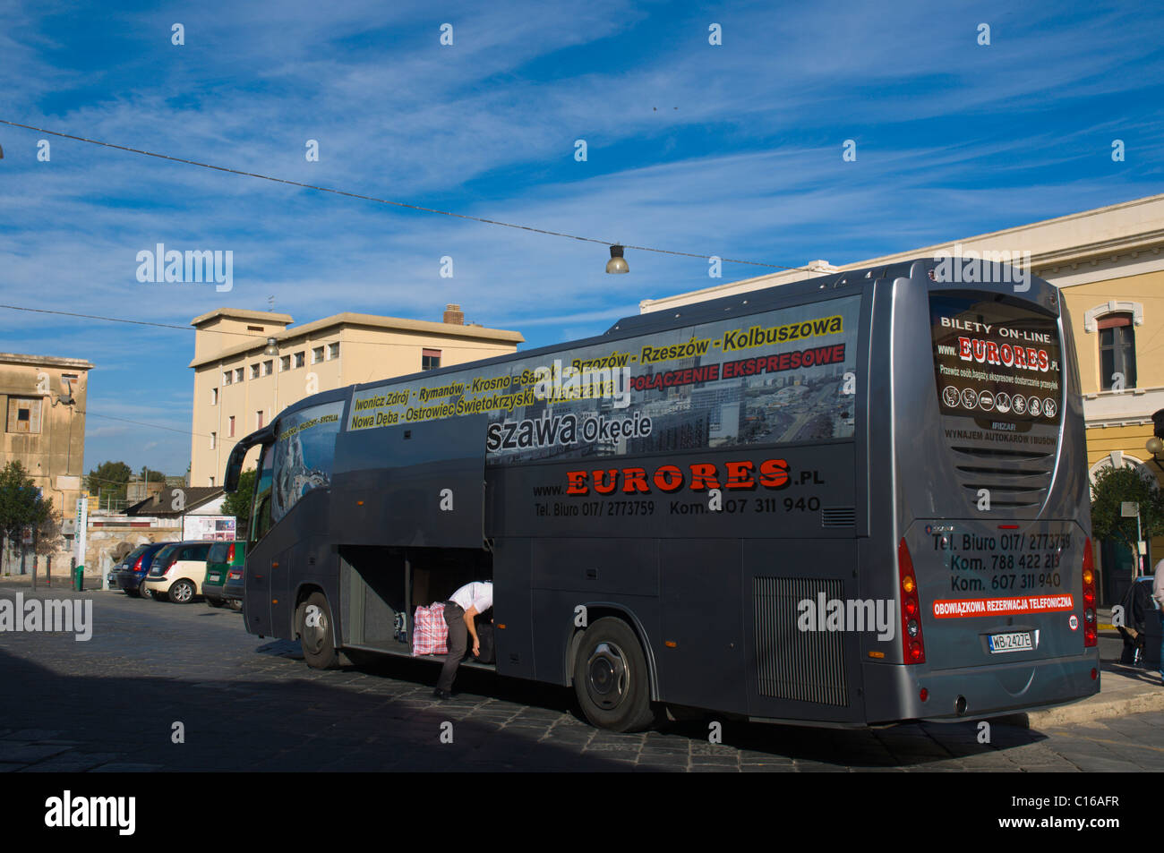 Polish bus transporting migrant workers and their relatives central bus station Syracuse Sicily Italy Europe Stock Photo