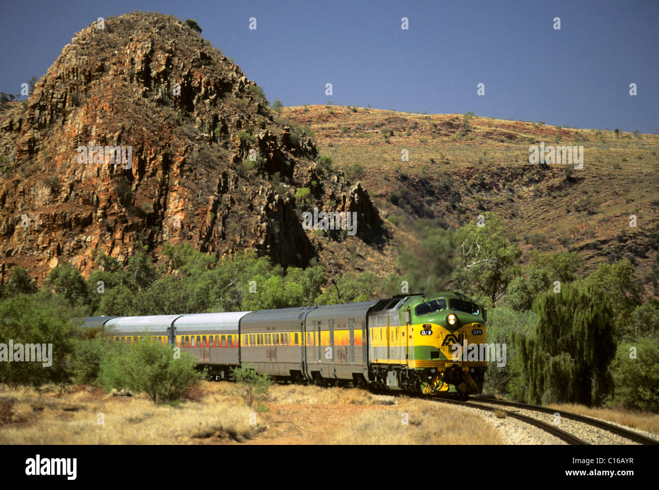Train of the railway line 'The Ghan' near Alice Springs, Red Centre, Northern Territory, Australia Stock Photo