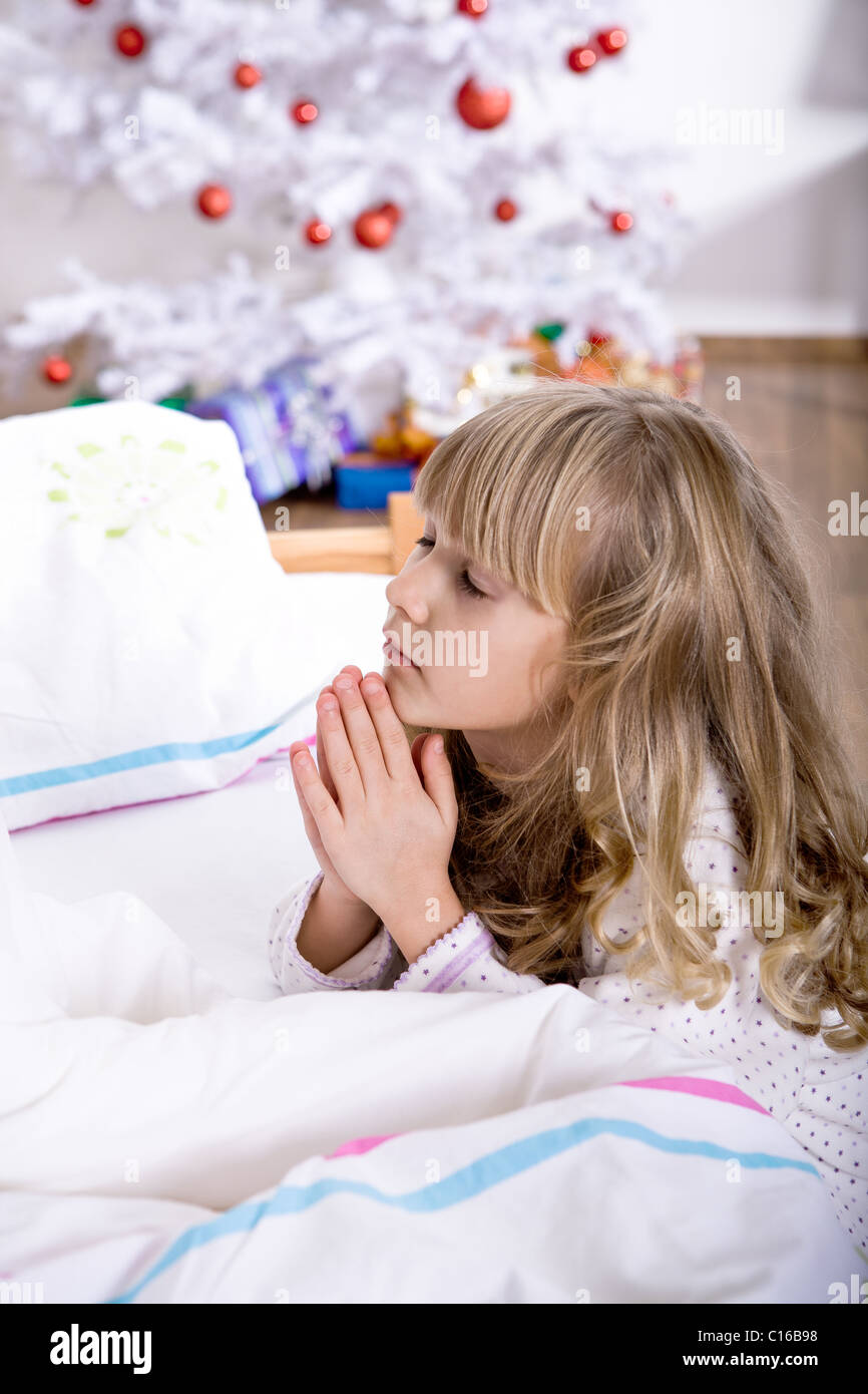xmas praying Stock Photo