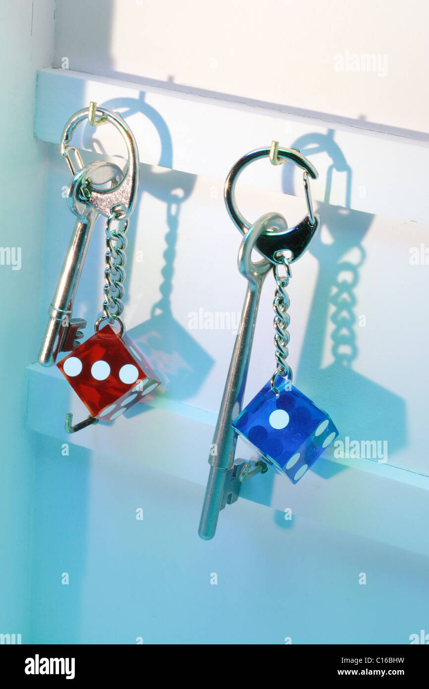 Dice key rings with keys Stock Photo Alamy