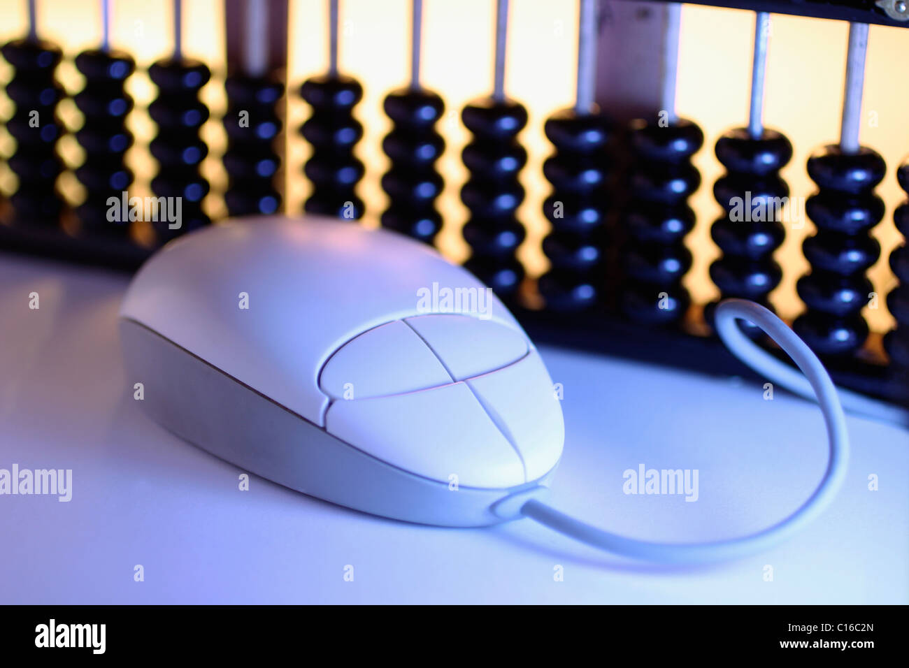 Computer mouse and abacus Stock Photo