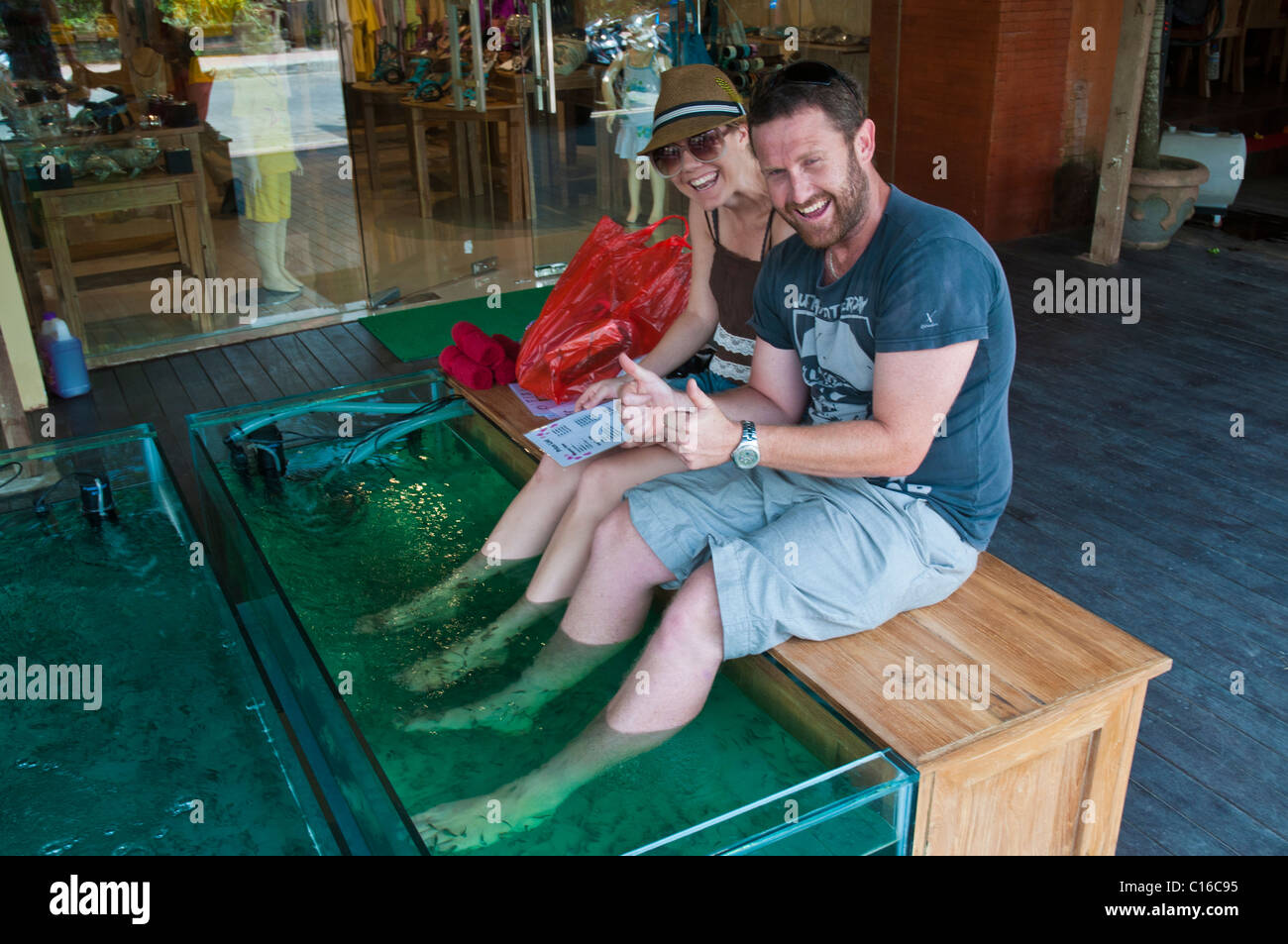 Touritst having a fish foot spa in Ubud Bali Stock Photo Alamy
