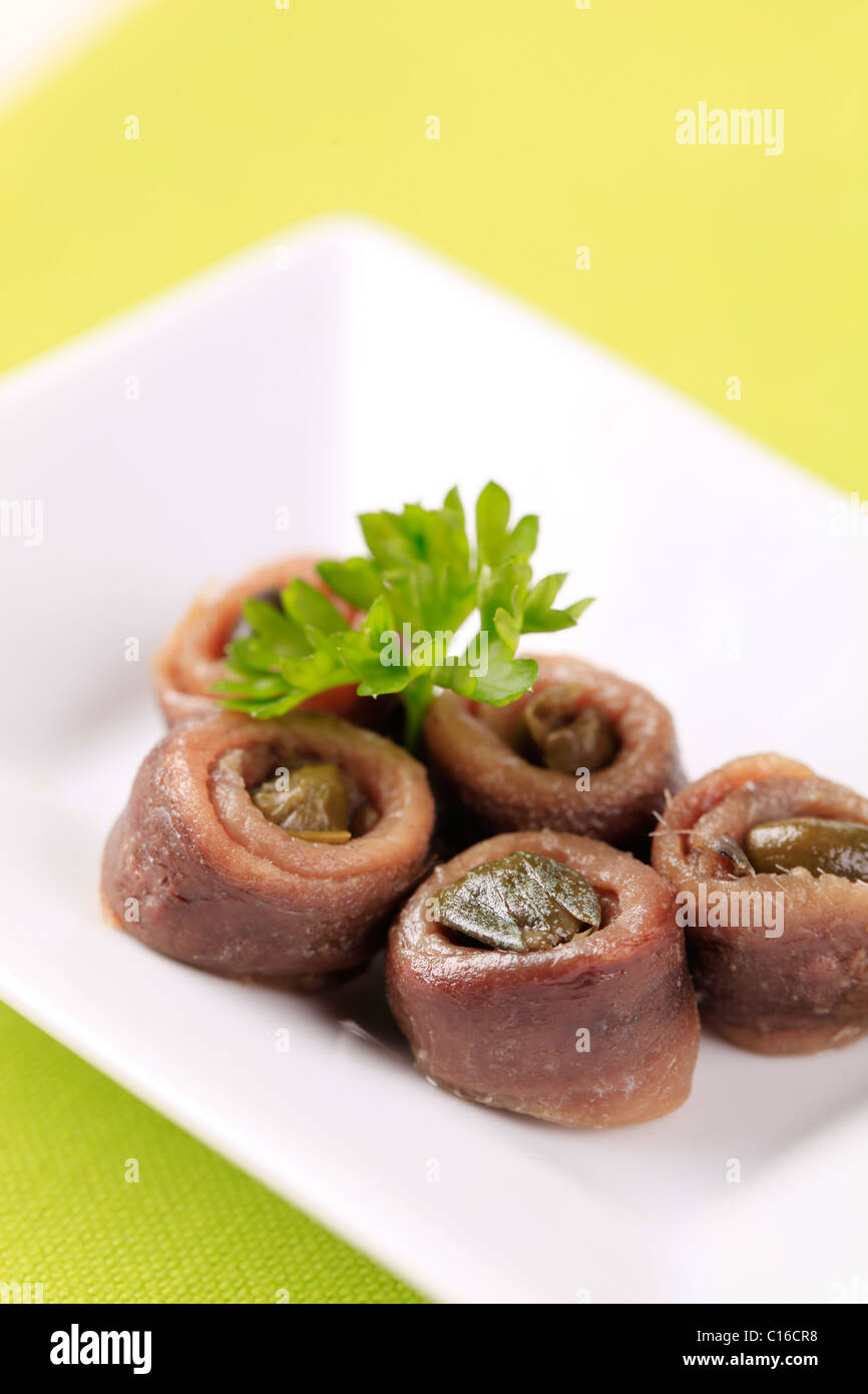 Rolled up anchovy fillets filled with capers Stock Photo Alamy