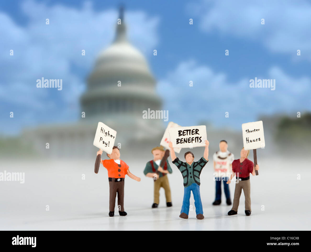 Protestors at the Capital Building concept image. Model figures representing protestors in Washington. Stock Photo