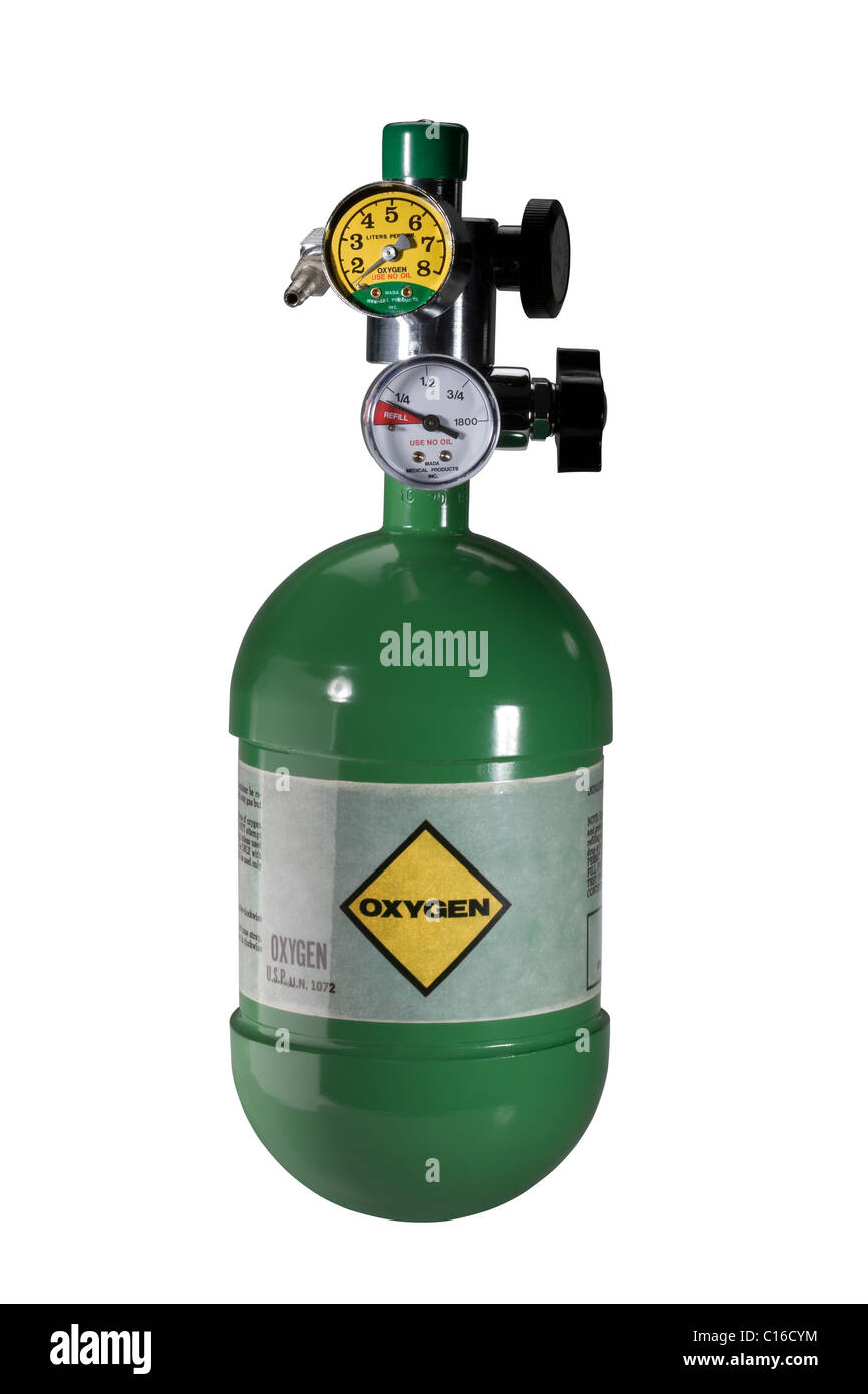 A green oxygen tank with pressure valves. Stock Photo