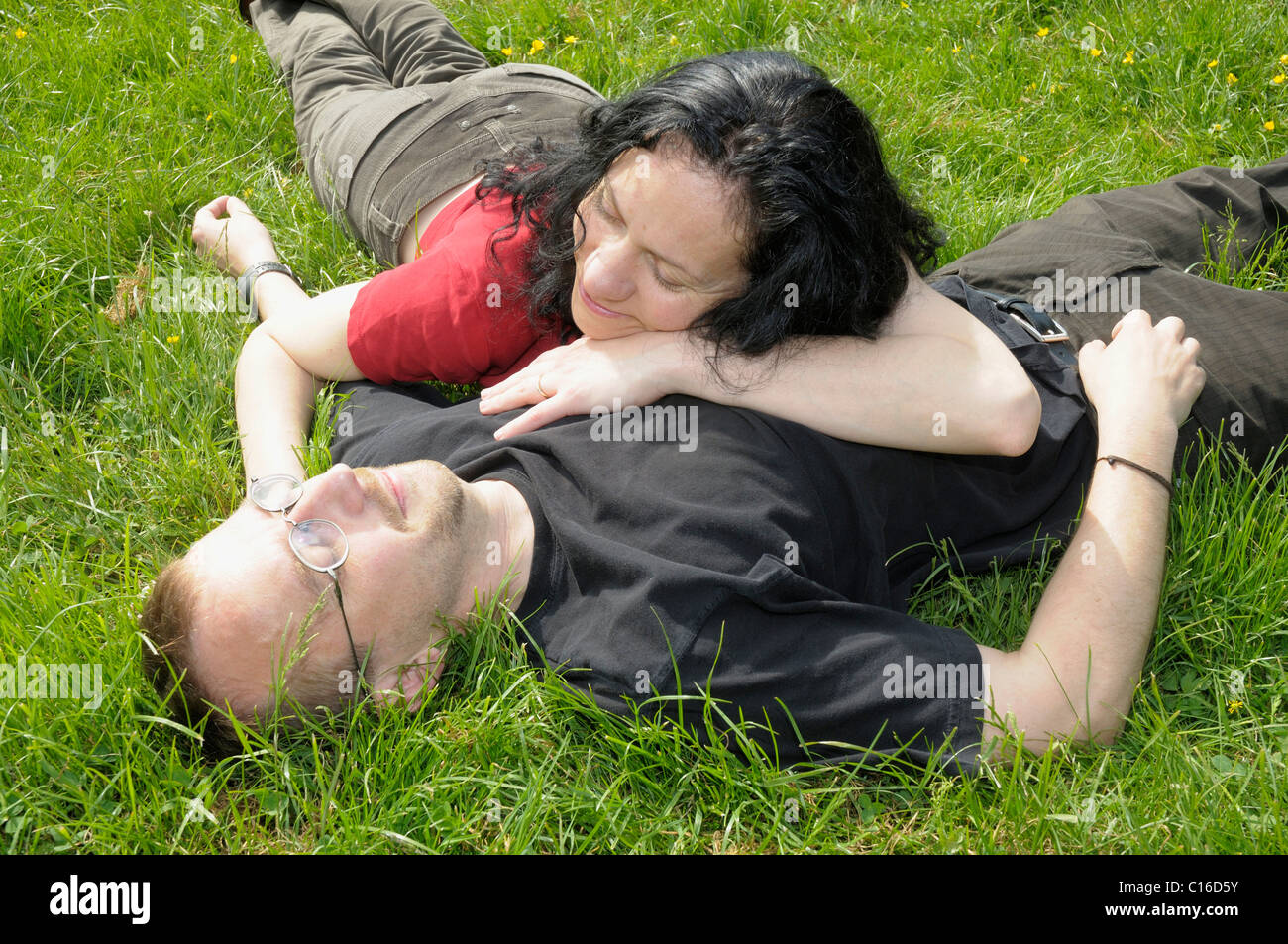 Joyful couple cuddles on hi-res stock photography and images - Alamy