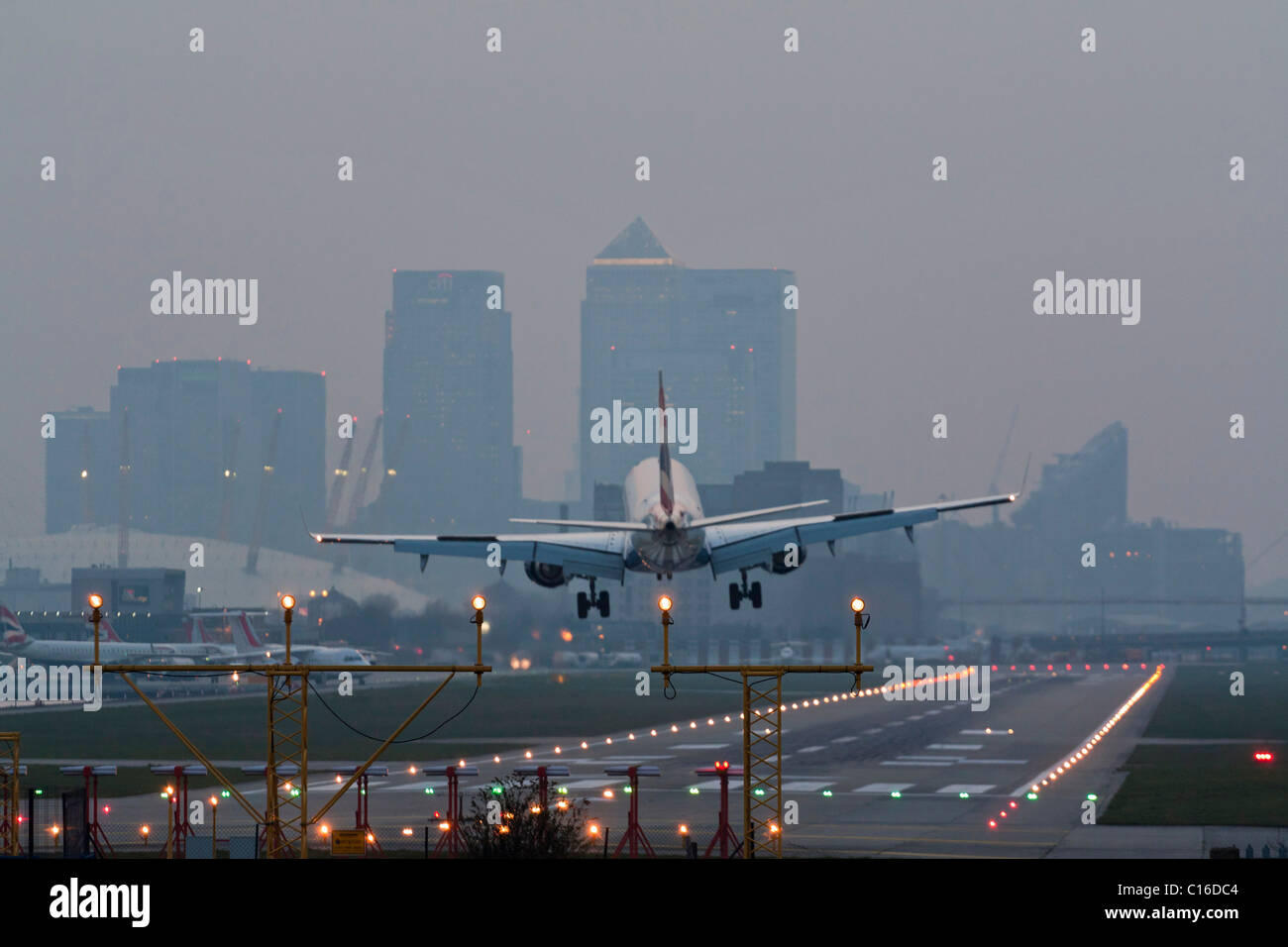 Airbus A318 Landing - London City Airport - Docklands Stock Photo