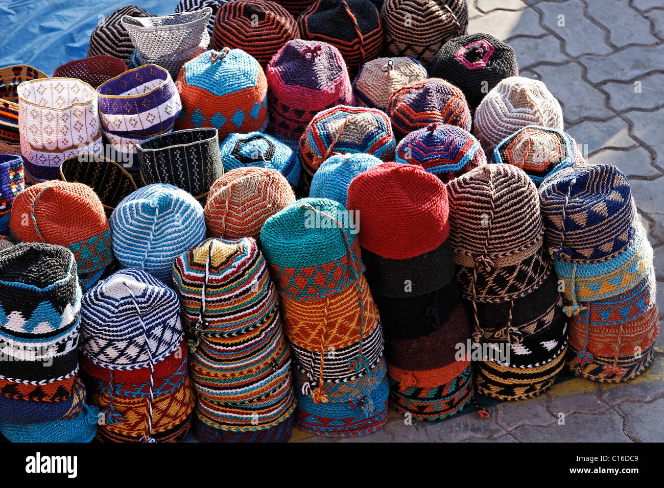 Pile of colorful Berber-wool caps, market square in Medina, Marrakesh, Morocco, North Africa Stock Photo
