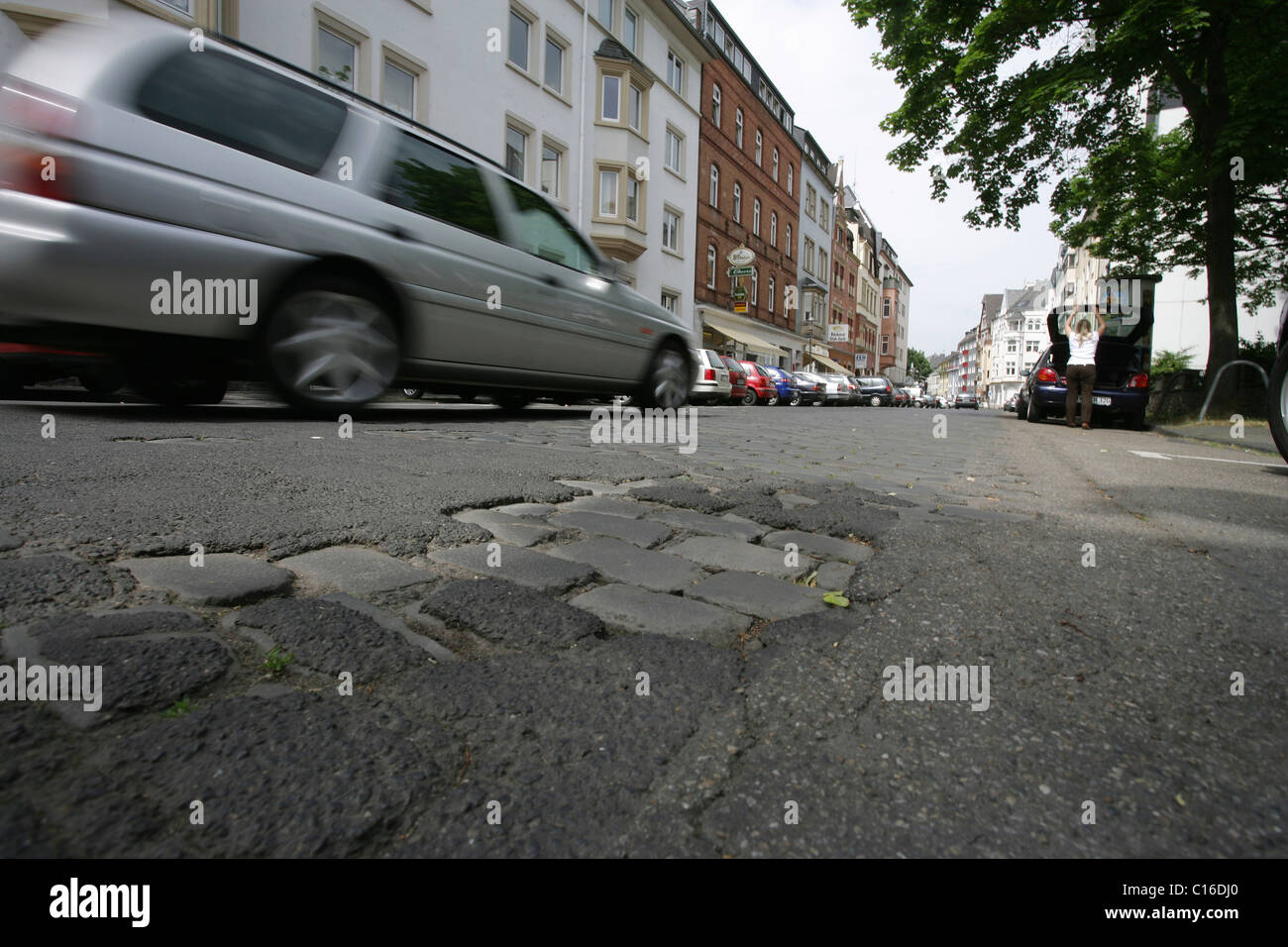 Pothole on an inner city street Stock Photo