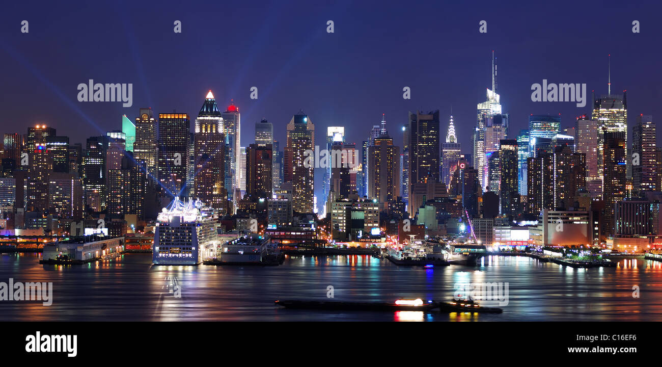 New York City Manhattan skyline panorama at night over Hudson River ...