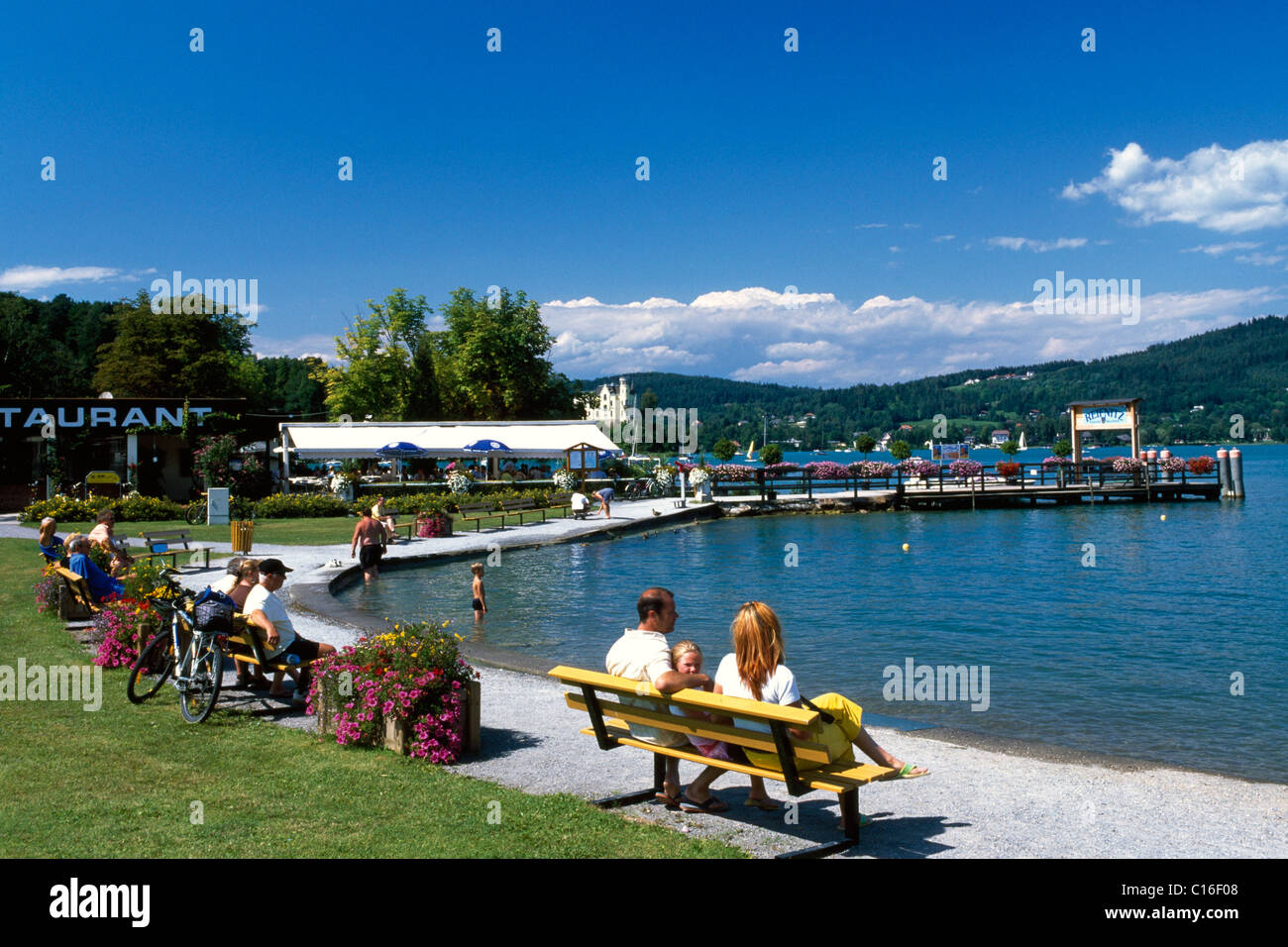 Promenade with benches, Lake Woerth, Reifnitz, Carinthia, Austria, Europe Stock Photo
