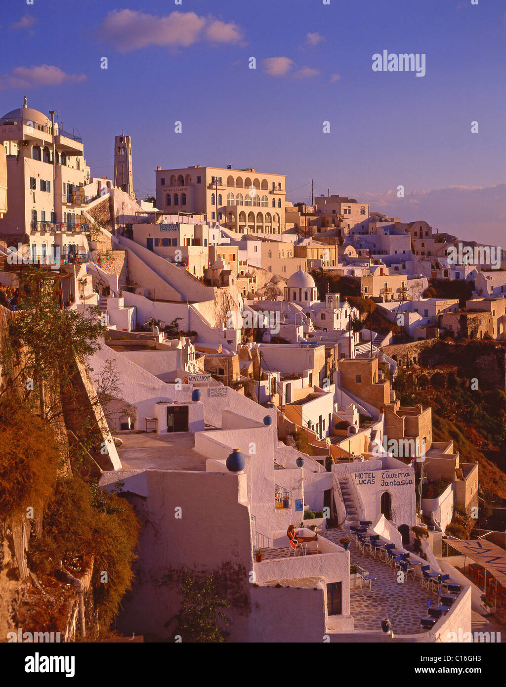 View of town at sunset, Fira, Santorini, The Cyclades, South Aegean, Greece Stock Photo