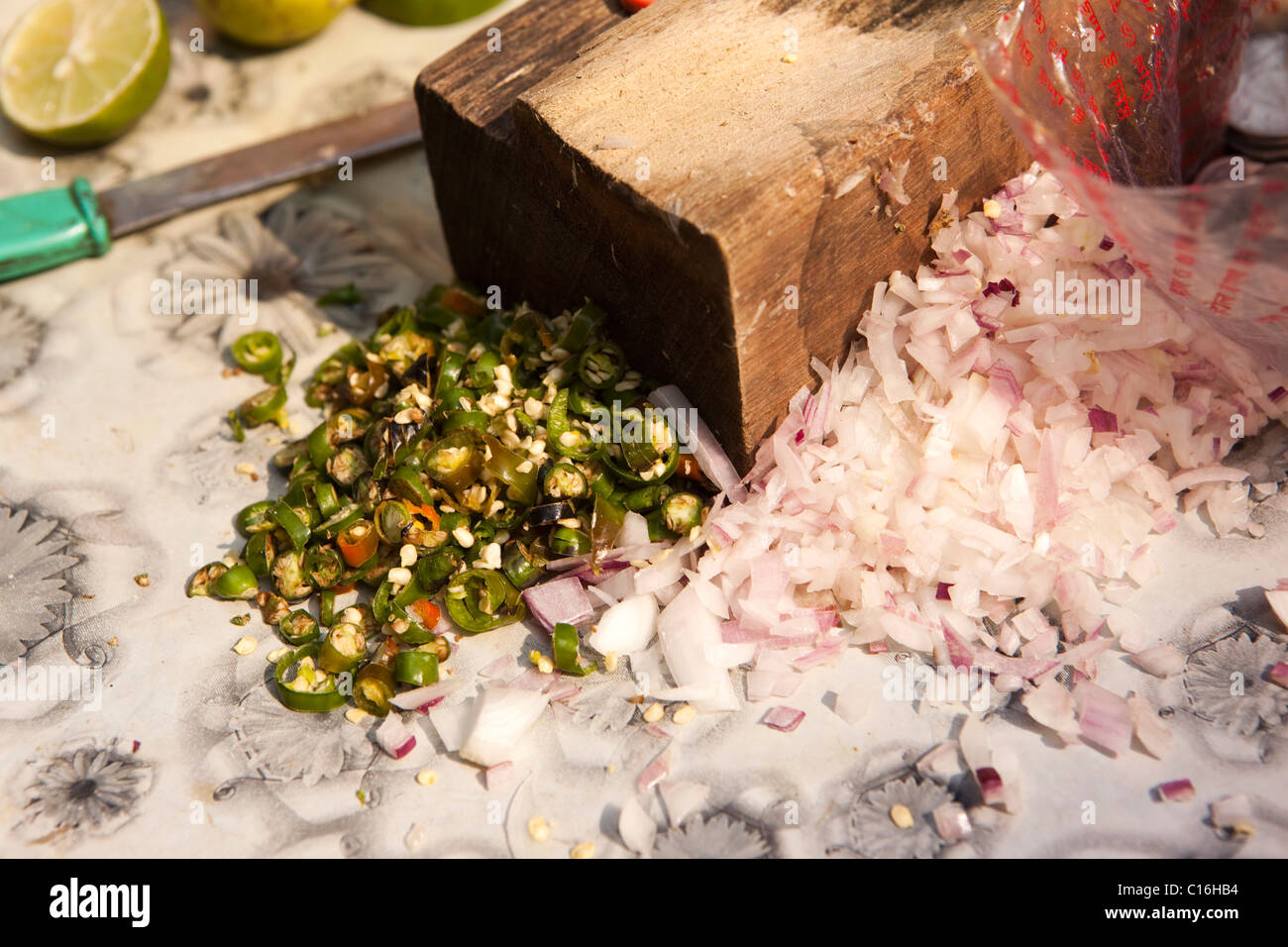India, West Bengal, Kolkata, Barabazaar, chopped green chillies and onion on roadside paan stall Stock Photo