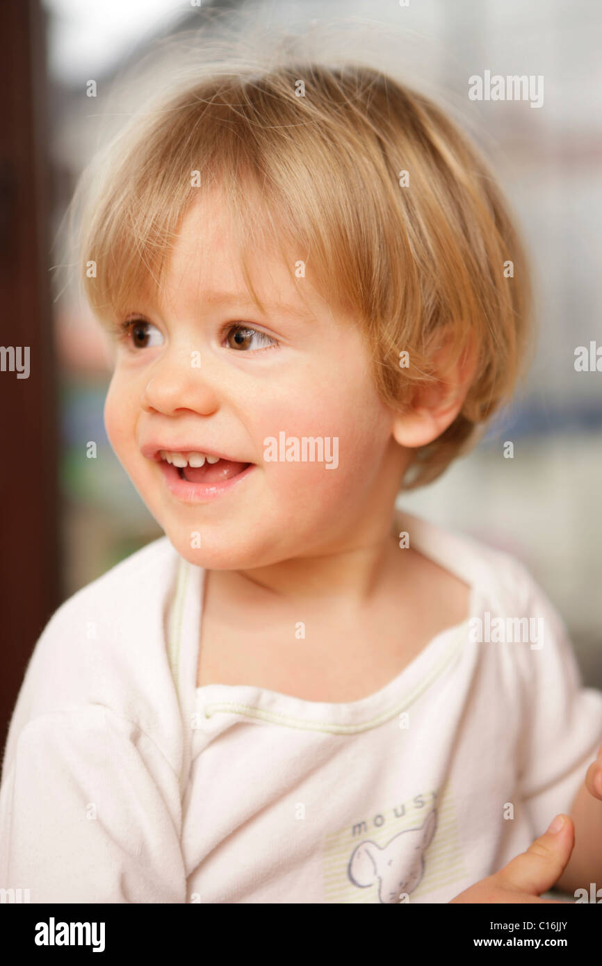 2 year old boy in a shirt, smiling Stock Photo