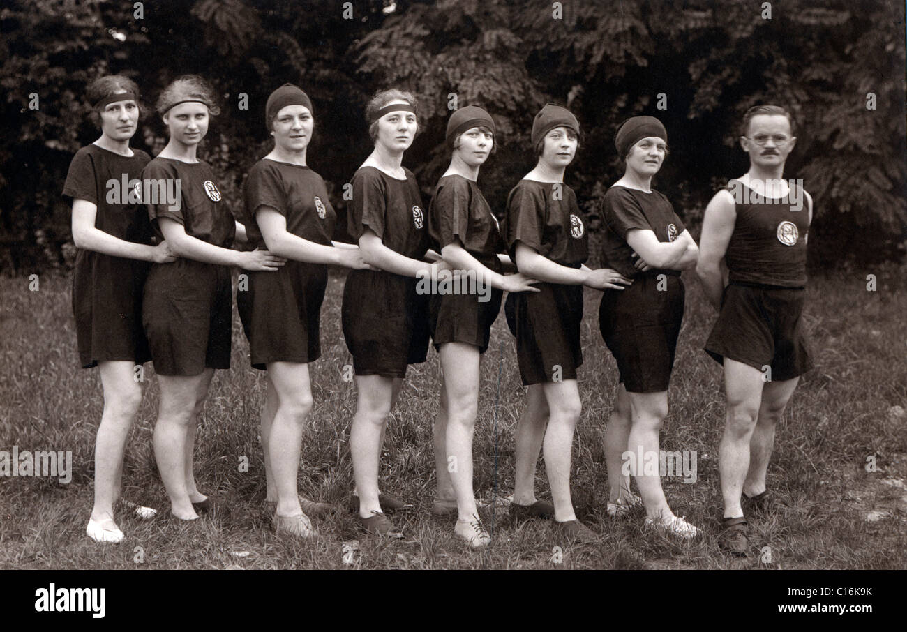 Historic photograph, female athletes with male trainer Stock Photo