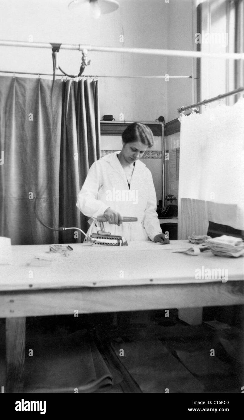 Historic photograph, woman ironing Stock Photo